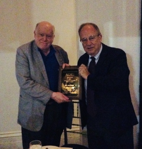 Jack Hipple (right) received award plaque from Joe Cramer, Management Division Chair (left).