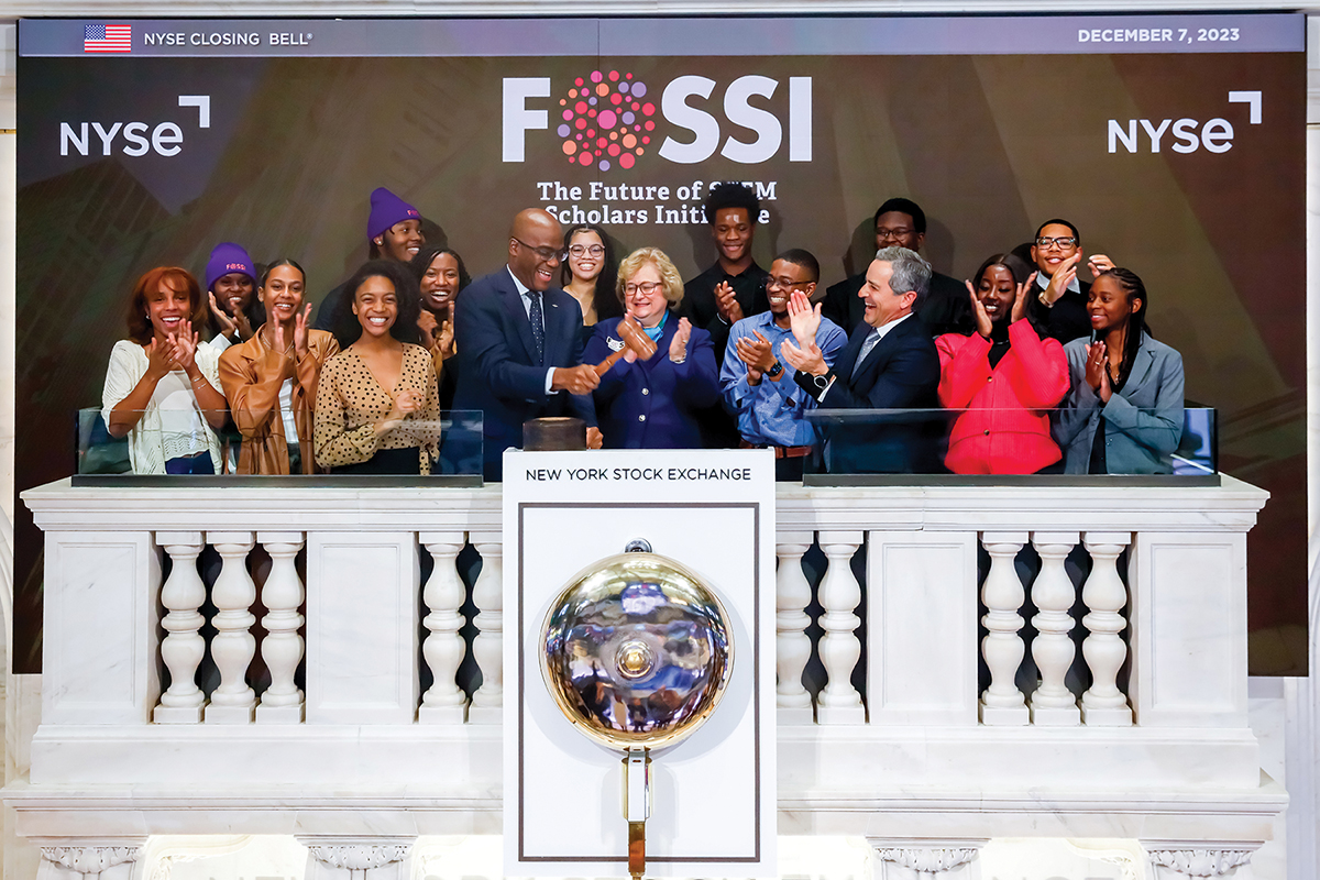 FOSSI Scholars ring the NYSE Closing Bell with Darlene Schuster, CEO of AIChE, and John Sampson, Senior Vice President, Operations, Manufacturing and Engineering at Dow