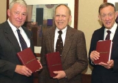 From left, Bird, Stewart and Lightfoot in 2001, with leather-bound 2nd Editions — and 62nd printings — of Transport Phenomena.