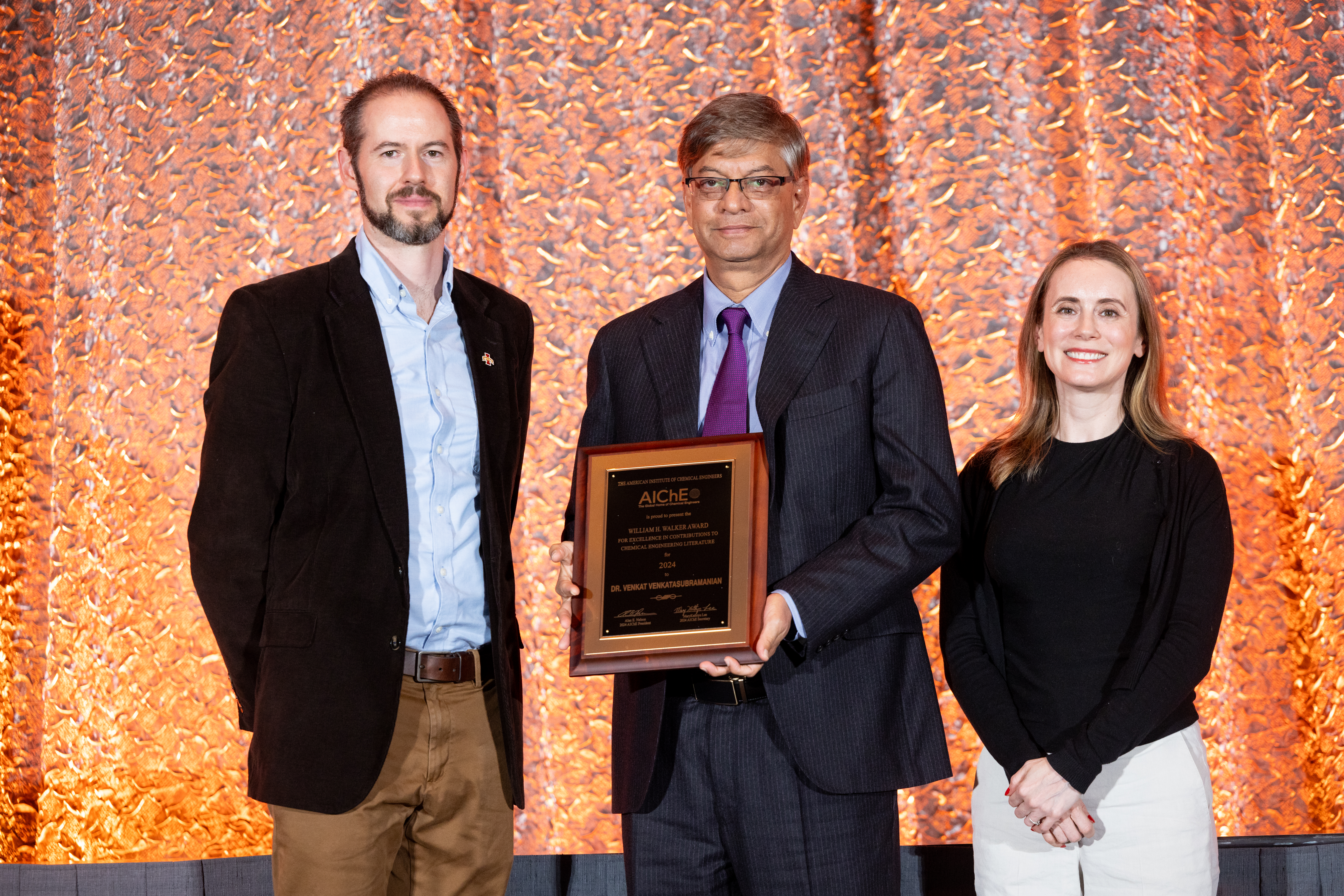  Dr. Venkat Venkatasubramanian (center) with Awards Selection Committee Chair Nigel Reuel (left) and John Wiley & Sons' Gillian Greenough (right)