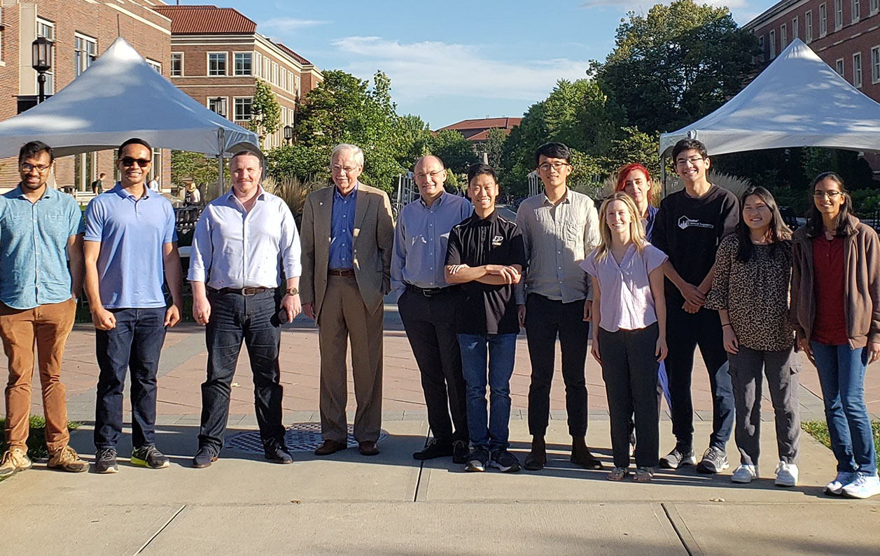 Dr. Reklaitis (fourth from left) with colleagues and members of his research team.