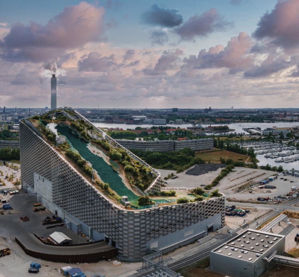 Figure 3. The Copenhill in Copenhagen is a waste-to-energy cogeneration plant that produces electricity and district heat. The facility also features an all-weather ski slope, climbing wall, and rooftop bar.