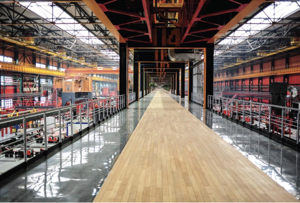 Figure 2. The Vysota 239 Plant in Chelyabinsk, Russia, is a pipe-rolling facility that produces pipelines for petroleum, natural gas, and water transportation. The facility features a sleek design, wood-paneled floors, and plenty of natural light.